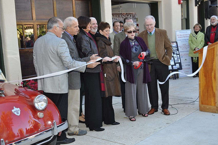 Ribbon cutting by honoree Pat Glass