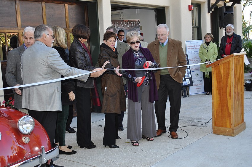 Ribbon cutting by honoree Pat Glass