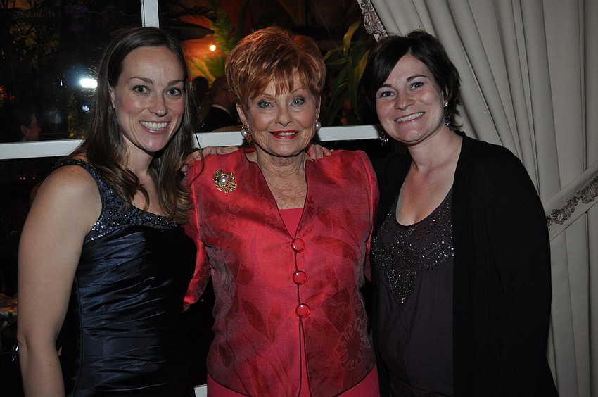 Katelyn Werner, honoree Mary Ann Robinson and Megan Werner