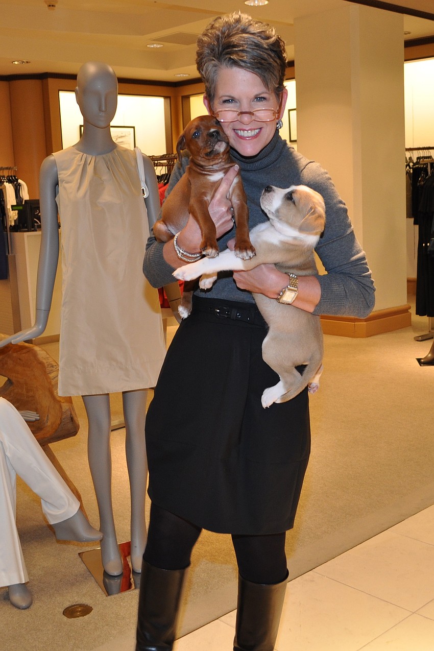 Sally Schule and puppies for adoption