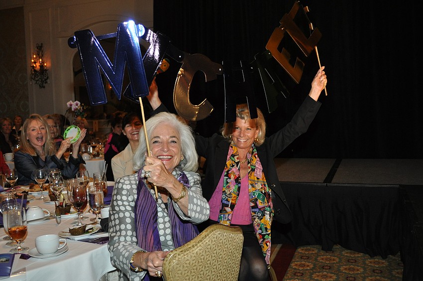 Graci McGillicuddy and Katie Moulton cheer on model Michael Moulton