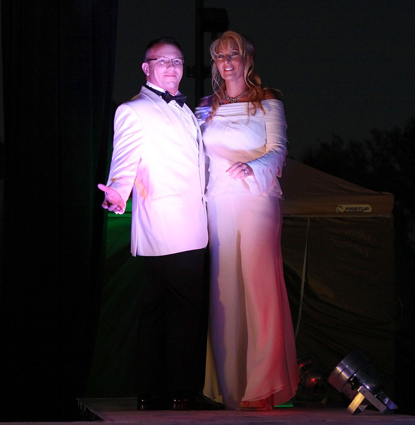 Jim Wilson and Debbie Plotts model for American Cancer Society's Cattle Barons Ball