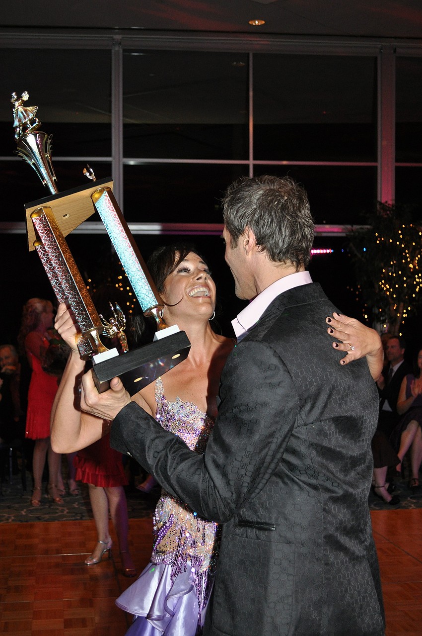 2009 champion, James Amato, presented the trophy to Dr. Tanya Schreibman