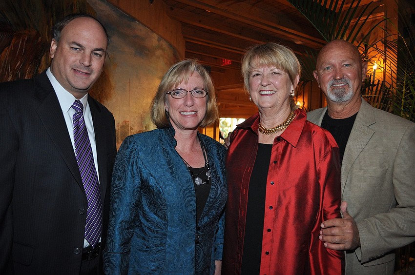 Sarasota Family YMCA President Paul Smith and Denise Smith with Nola and Larry Hietbrink