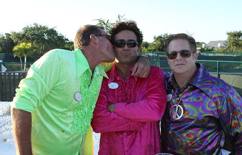 Tony, Carl and Jimmy get a bit silly for the camera while working Black Tie Bash