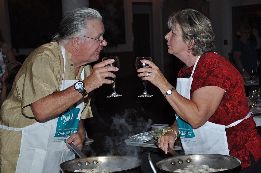 Dave Osborn and Shelia Rose toast to a fun night
