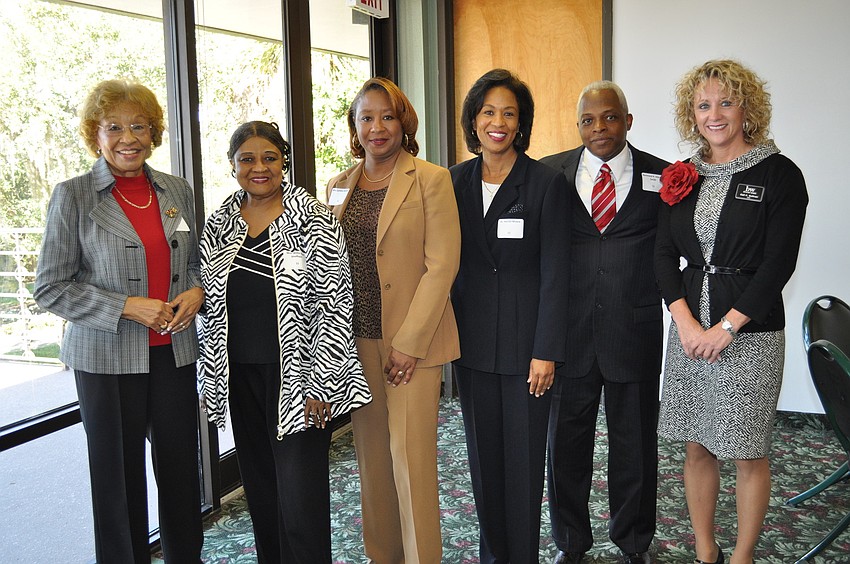 Estella Thomas, Willie Mae Sheffield, Cynthia Hudson, honoree Dr. Harriet Moore, Rev. R. Vincent Smith and Gail Sullivan