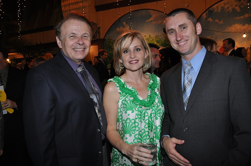 Dr. Larry Thompson with Jennifer and John McAlister