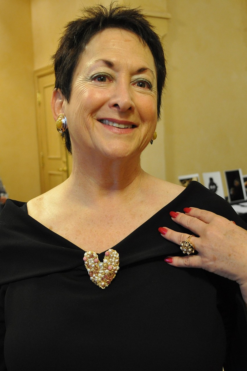 Barbara Zdziarski modeling live auction items