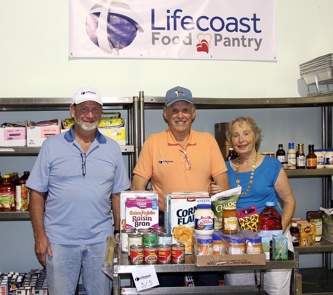 Lifecoast Pantry volunteers, Rex Coble, Jim King, and Shirlene Limb, help those in need, one person at a time. (Photo by Jacque Estes)