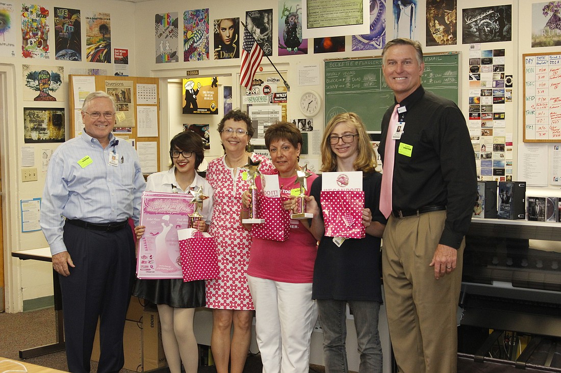 Bill Tol,  Isabelle Brenes (first place), Nancy Gibbs, Elaine Gonsalves, Logan Johnson (third place) and John Subers at the poster award presentation at Flagler Palm Coast High School. Emily Morris (second place) not in photo. Courtesy Photo