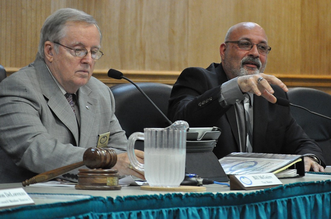 Councilman Steve Nobile, at right, made his case Oct. 6 for a city charter review. City Councilman Bill McGuire is at left. (Photo by Jonathan Simmons.)