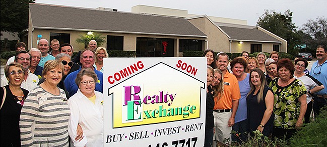 Realty Exchange has upgraded to a larger office located in Island Walk. The new office will be open in early 2016. Courtesy Photo