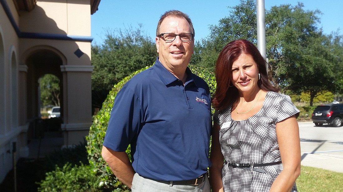 Garry Lubi, senior vice president, and Maria Lavin-Sanhudo, vice president and branch manager