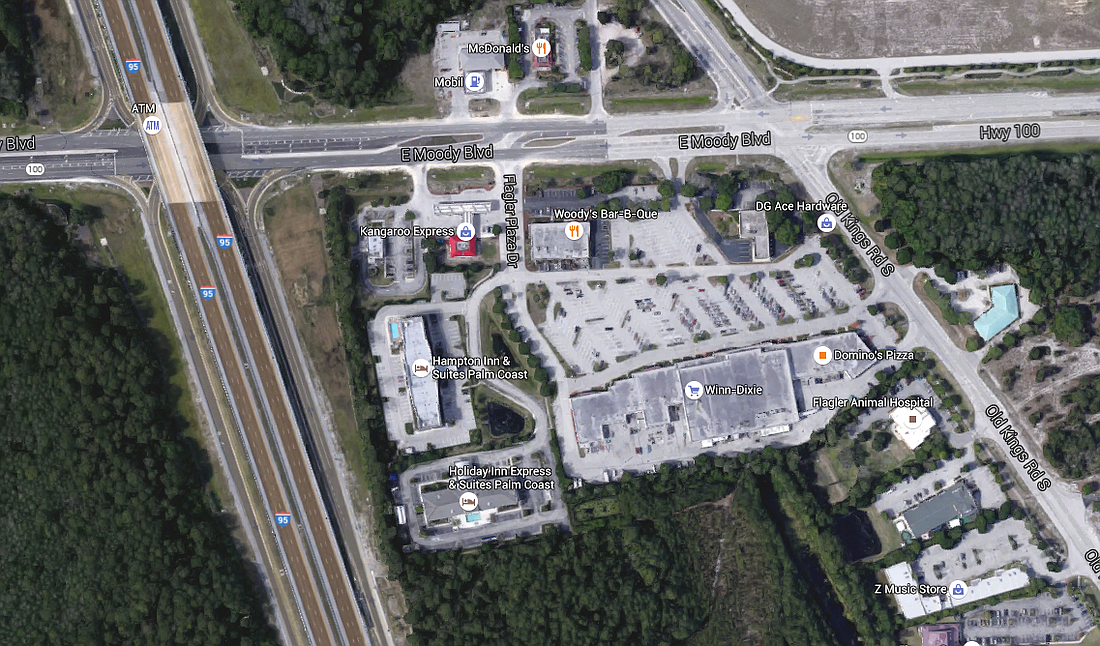 The Holiday Inn Express and the Hampton Inn are next to each other. Deputies found discarded items from the break-ins dumped behind the Mobil station across the street. (Image from Google Maps.)