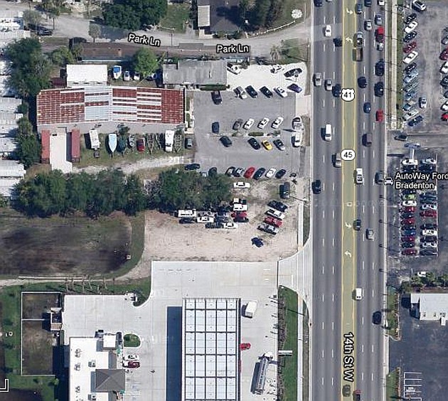 Two U.S. 41 buildings sold for Stan Thompson Auto Sales Business Observer