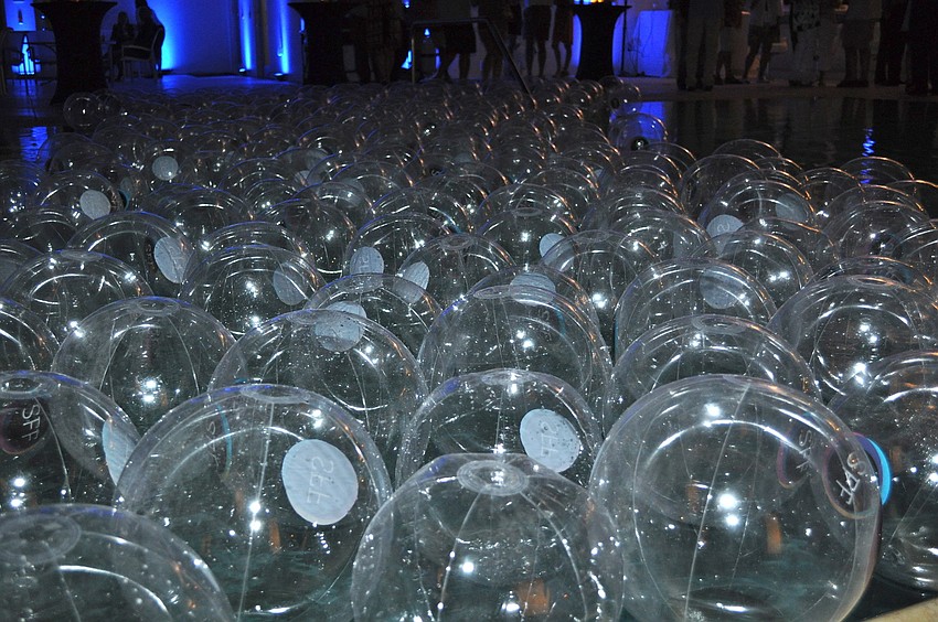 Plastic beach balls bearing the Sarasota Film Festival logo floated in the Sarasota Yacht Club pool.