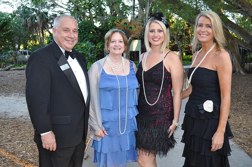 Thomas and Kent Buchter, Chairwoman Kristiana Serbin and Nora Johnson