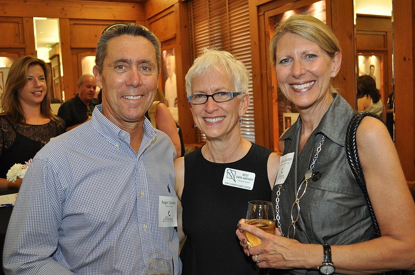 Roger Courtois, Betsy Kane-Hartnett and Patricia Courtois