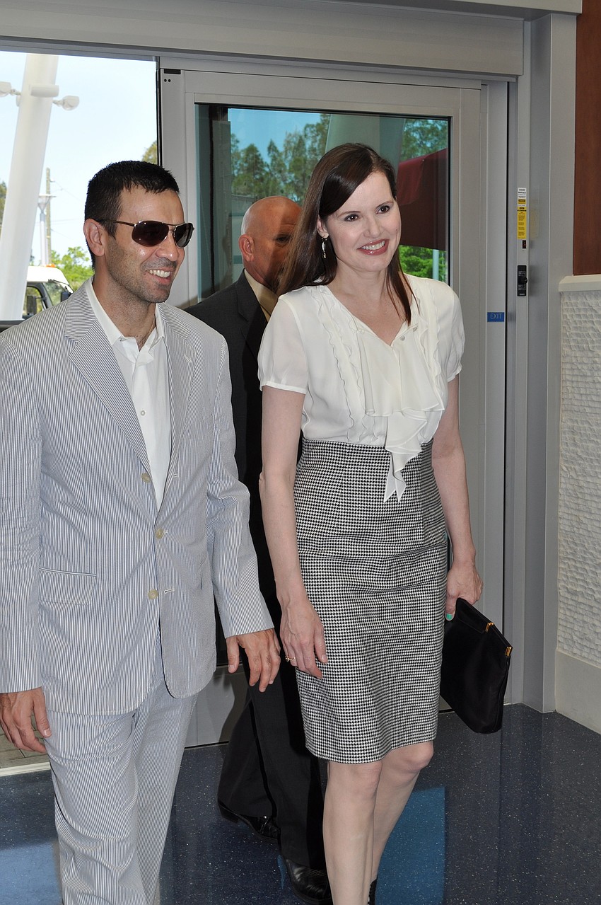 Reza Jarrahy and Geena Davis make their entrance.