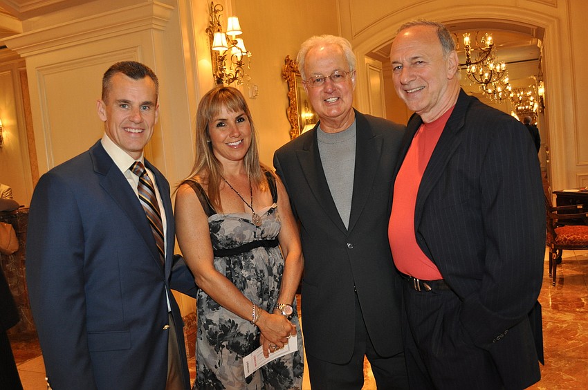 Coach Billy and Christine Donovan with Pat Williams and Peter Vecsey