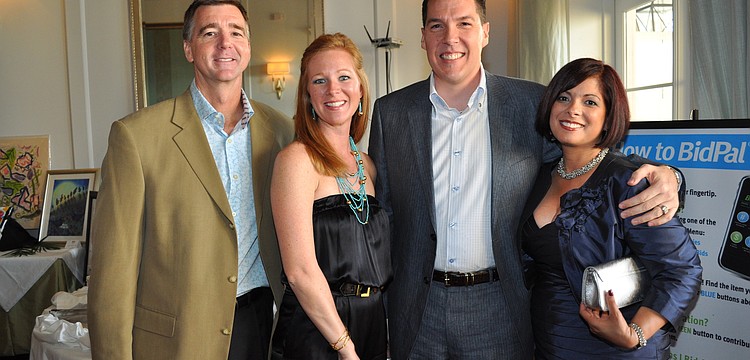 Michael and Julie Dooley with Luis and Michelle Toro