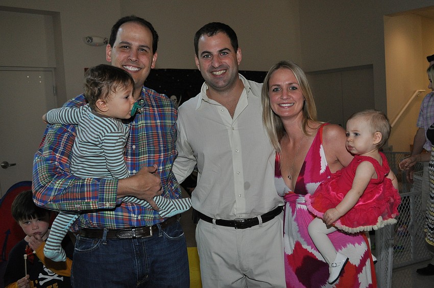 Dr. Adam and Andrew Getzels with Dr. Mark, Tanya and Ella Ramos