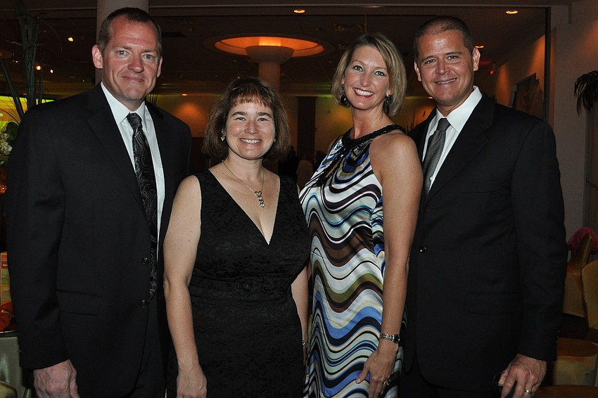 Justine and Scott Holcomb, Hollie and Raymond Walterson