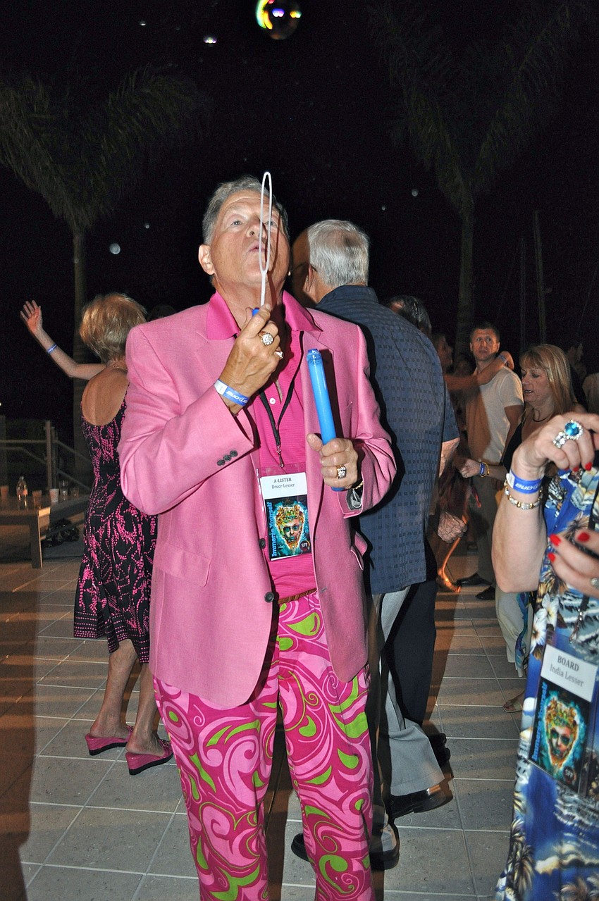 Bruce Lesser blows bubbles