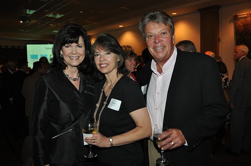 Honoree Diane McFarlin with Becky Titus and Elliott Metcalfe