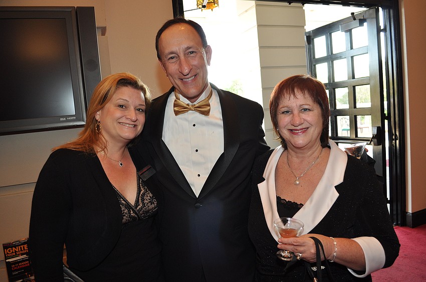 Tricia Mire with Bruce and Janet Udell