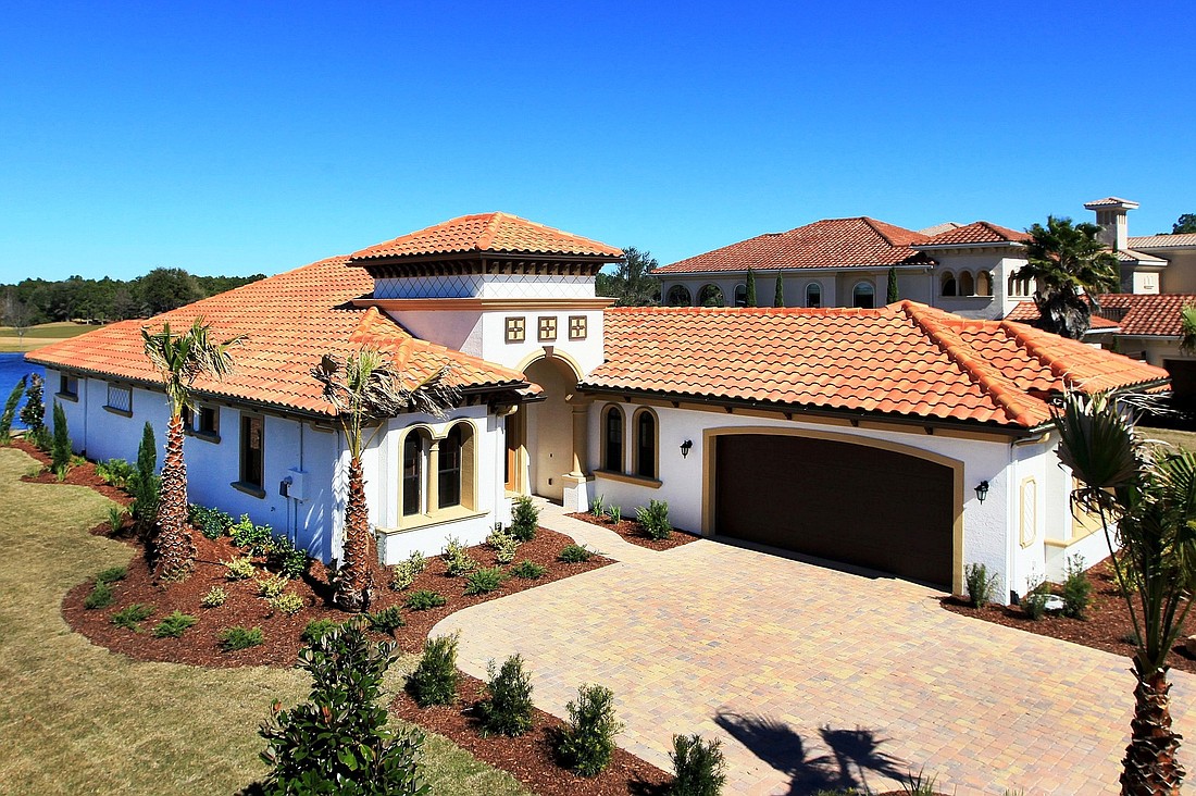 Gold Coast Custom Homes held a ribbon-cutting event at this Conservatory model home last month.