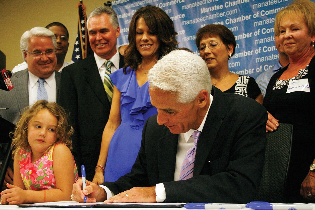 Former Gov. Charlie Crist signed the Mark Wandall Traffic Safety Act in Lakewood Ranch last year.