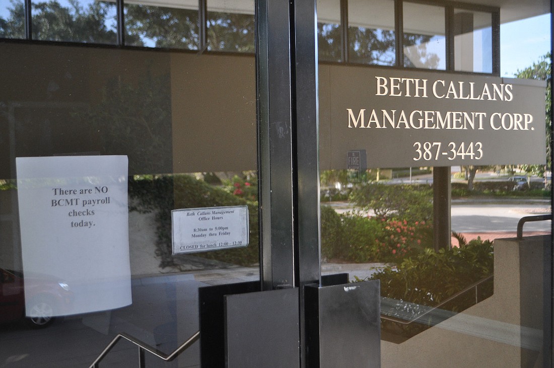 A sign on the entrance to company headquarters states: 'There are NO BCMT payroll checks today.'