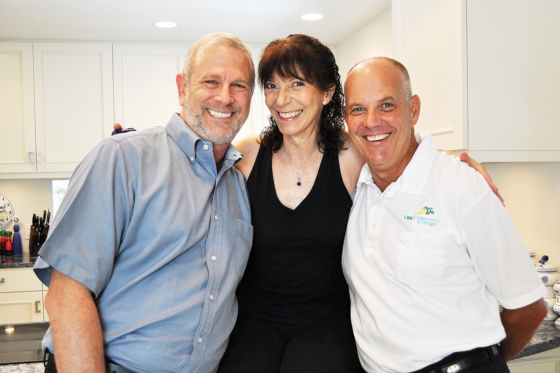 David Asher, of Eurotech Cabinetry, and Gregg Kaplan, of LBK Contractors and Design, and their client, Carolyn Michel.