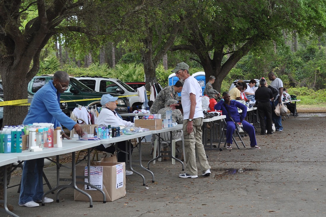 Volunteers handed out donated clothing, food and other goods to veterans at the first Flagler County Stand Down for Homeless Veterans event March 29, 2013. (Photo by Jonathan Simmons.)