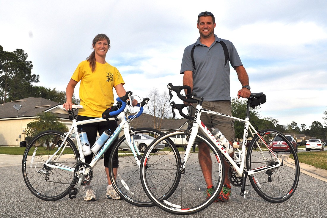 Rachel Ryba and Chad Ryba have worked out daily to prepare for the South Beach Triathlon, where they'll swim .93 miles, bike 24.25 miles and run 6.2 miles. (Photo by Jonathan Simmons.)