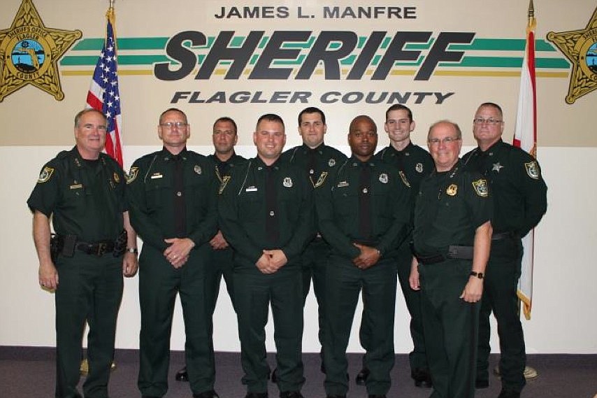 Front row, left to right: Undersheriff Rick Staly, Andrew Pearson, Rich Petkovsek, Robin Towns and Sheriff James L. Manfre. Back row, left to right: Mark Remish, Jacob West, Chris Taylor and Stephen Usina.