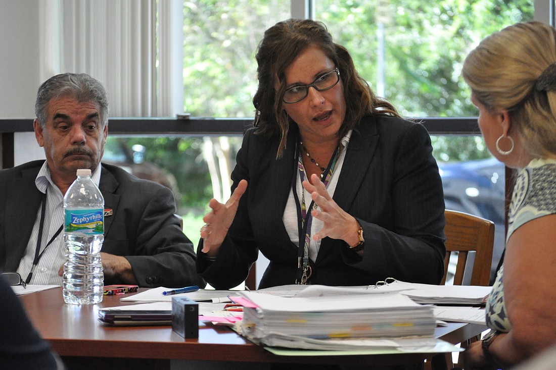 Canvassing board members George Hanns, Melissa Moore Stens and Kimberle Weeks. (Photo by Jonathan Simmons.)