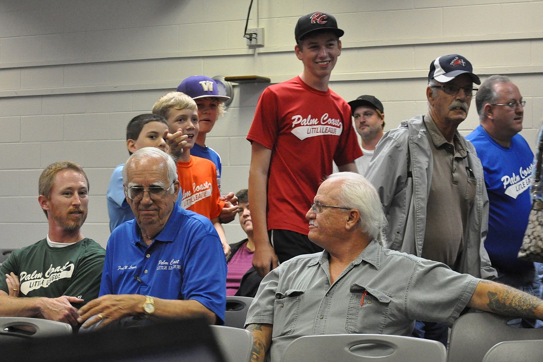 Little League players, parents and volunteers came to the Dec. 2 City Council meeting. (Photo by Jonathan Simmons.)