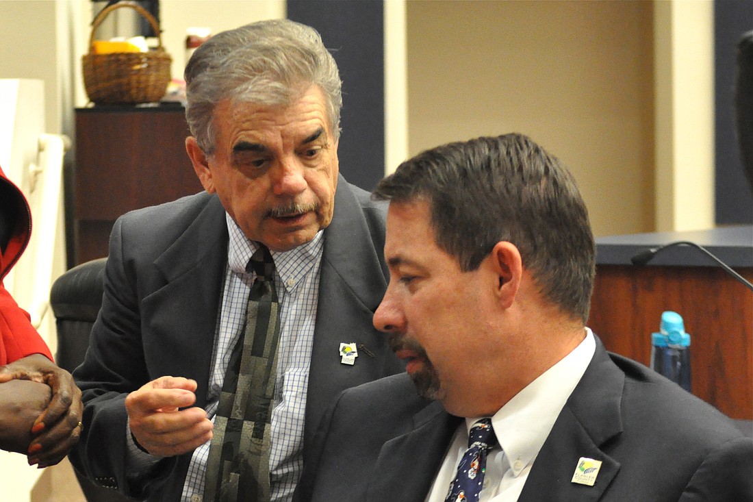 Commissioner George Hanns and County Administrator Craig Coffey. (Photo by Jonathan Simmons.)