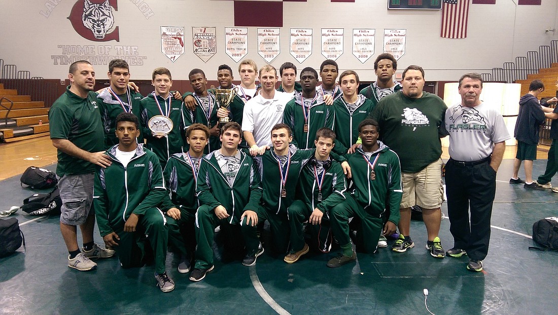 The Flagler Palm Coast wrestling team beat out 28 teams to win the first meet of the season in Tallahassee.