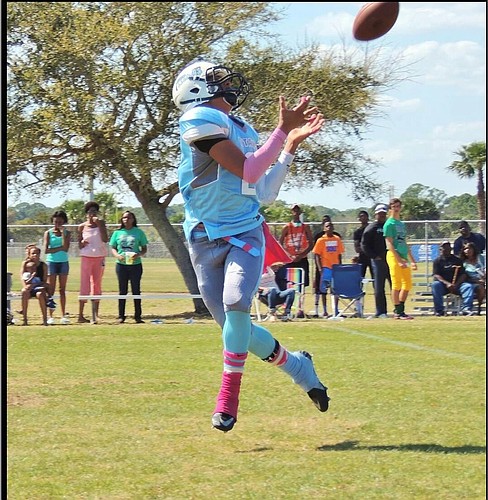 Anthony Buchanan intercepts a pass on his spring travel team.