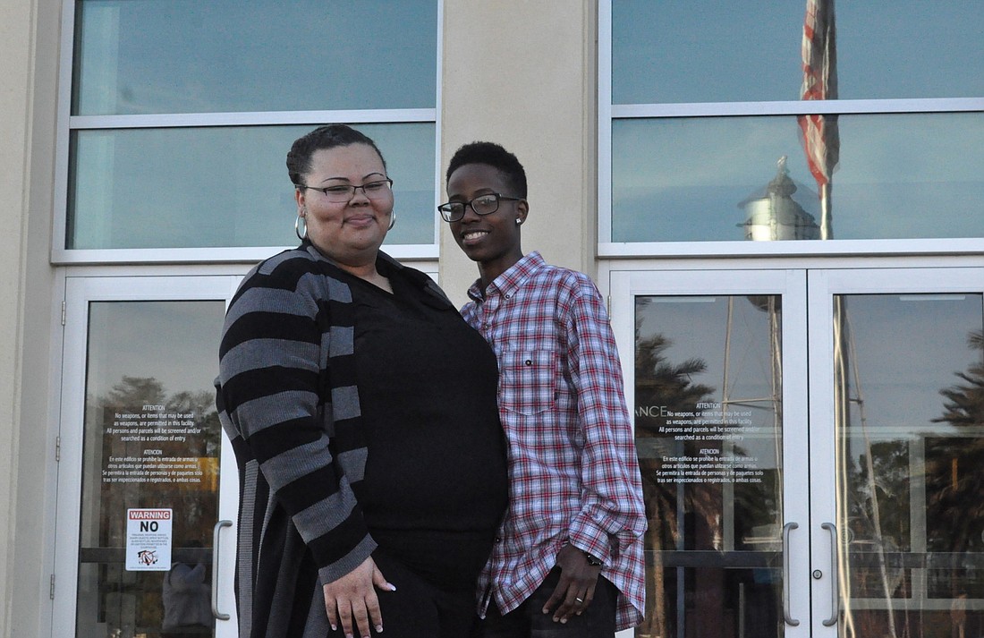 Flagler CountyÃ¢â‚¬â„¢s first same-sex couple to apply for a marriage license as gay marriage becomes legal Jan. 6: Palm Coast residents Mercedes Hall and Corah Raulerson, both 23. (Photo by Jonathan Simmons.)