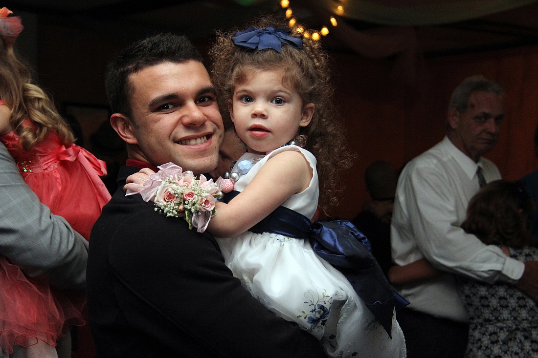Justin Rivera dances with his daughter, Gianna, at the Daddy Daughter Princess Ball hosted by the city of Palm CoastÃ¢â‚¬â„¢s Parks and Rec. department. PHOTOS BY SHANNA FORTIER