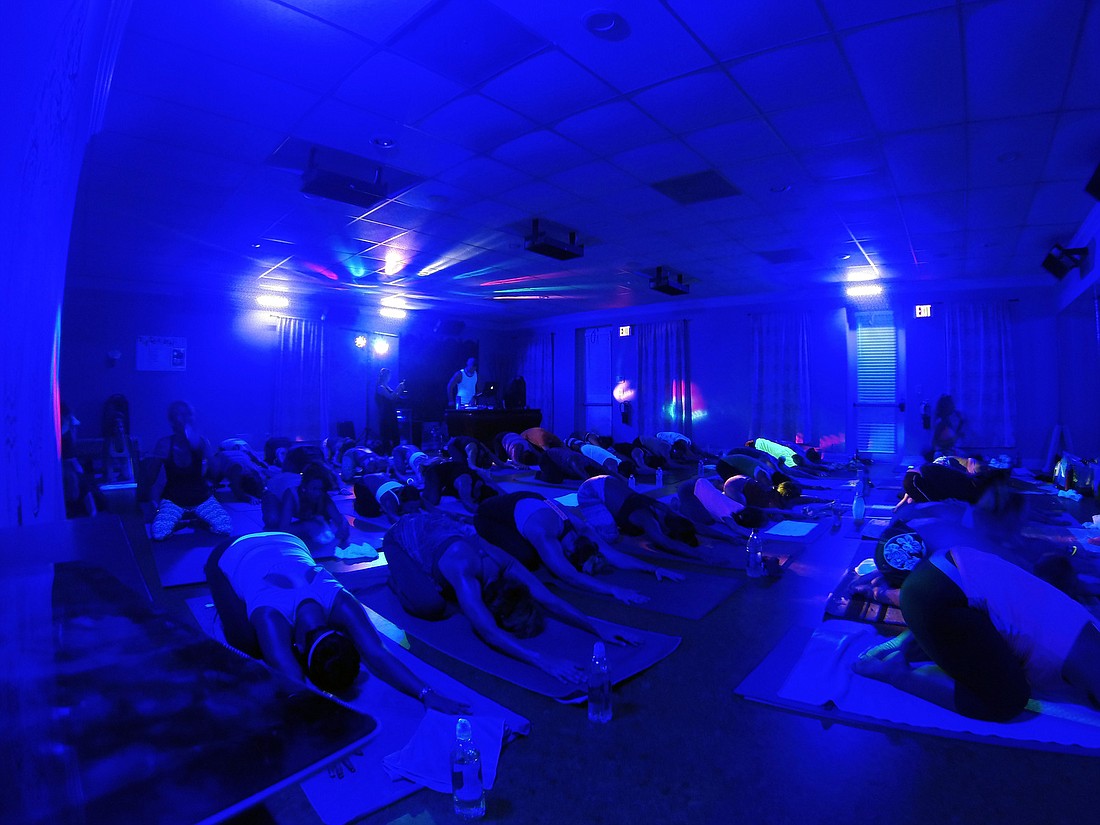 Close to 60 people attended Yoga Studio 8Ã¢â‚¬â„¢s first live DJ hip hop yoga event.