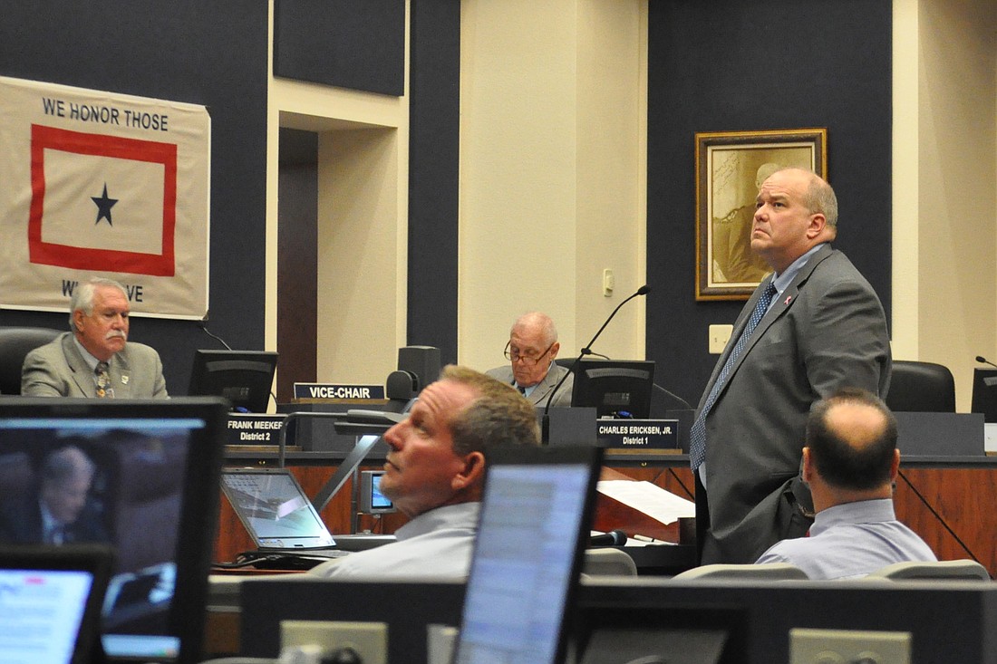 County Planner Adam Mengel addresses the County Commission. (File photo by Jonathan Simmons.)