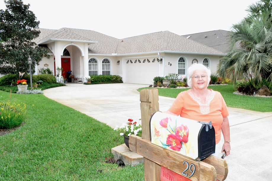 Palm Coast resident Jane Villa-Lobos spends a lot of time and energy making her yard a model neighbor and representative of Palm CoastÃ¢â‚¬â„¢s beauty. (Photos by Jonathan Simmons.)