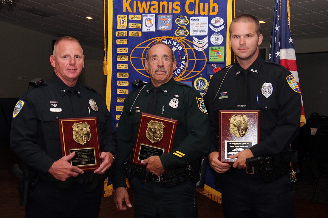 2015 Flagler Palm Coast Kiwanis Club Law Enforcement Officers of the Year Johnny Bingham, Frank Barbagallo and Shane Tully (not pictured, Shane Groth)