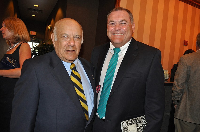 Event founder Col. Edward Brown caught up with SOA Junior ROTC Event Coordinator Peter Hayes before the dinner.